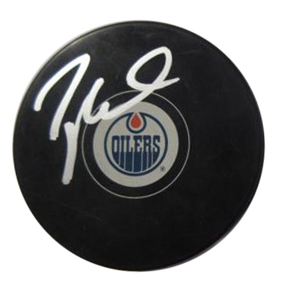 Taylor Hall - Signed Puck Oilers