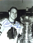 Bobby Hull Signed 8x10" Unframed Black and White Photo Chicago Blackhawks V Pose w/Stanley Cup