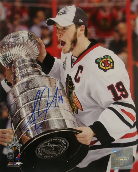 Jonathan Toews Signed 8x10 Unframed Blackhawks 2010 Carrying Cup