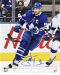 John Tavares, Signed 8x10 Unframed Maple Leafs Action with "C"