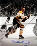 Bobby Orr, Signed 8x10 Unframed Bruins White Rookie Puck In Air