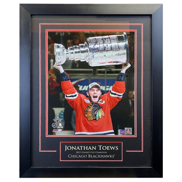 Jonathan Toews Signed Chicago Blackhawks 16x20 Hoisting the Stanley Cup 2015 Framed