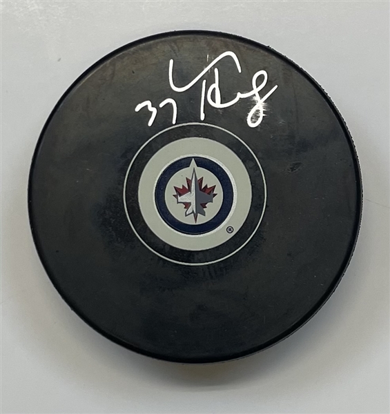 Connor Hellebuyck Winnipeg Jets Signed Puck "imperfect"