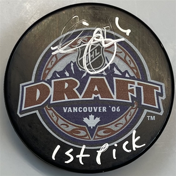 Erik Johnson Signed Puck "imperfect"