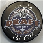 Erik Johnson Signed Puck "imperfect"